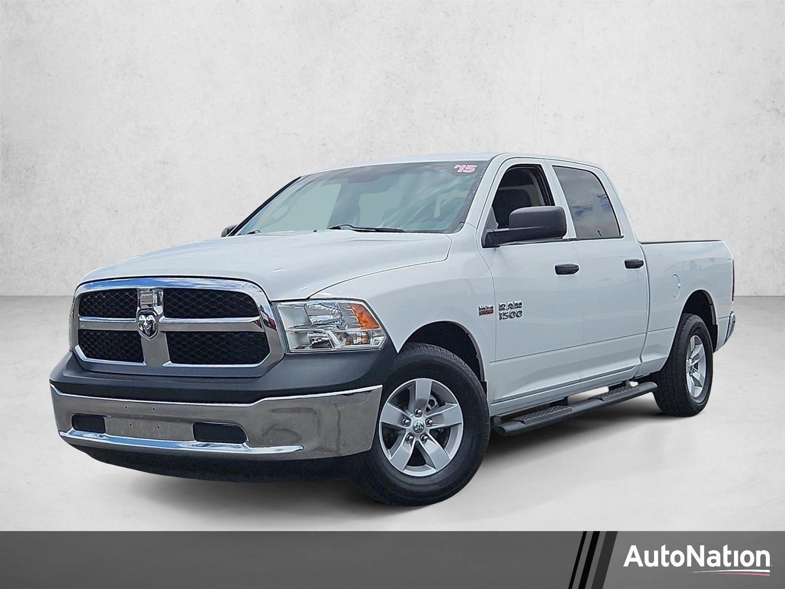 2015 RAM 1500 Tradesman in White — front three-quarter view
